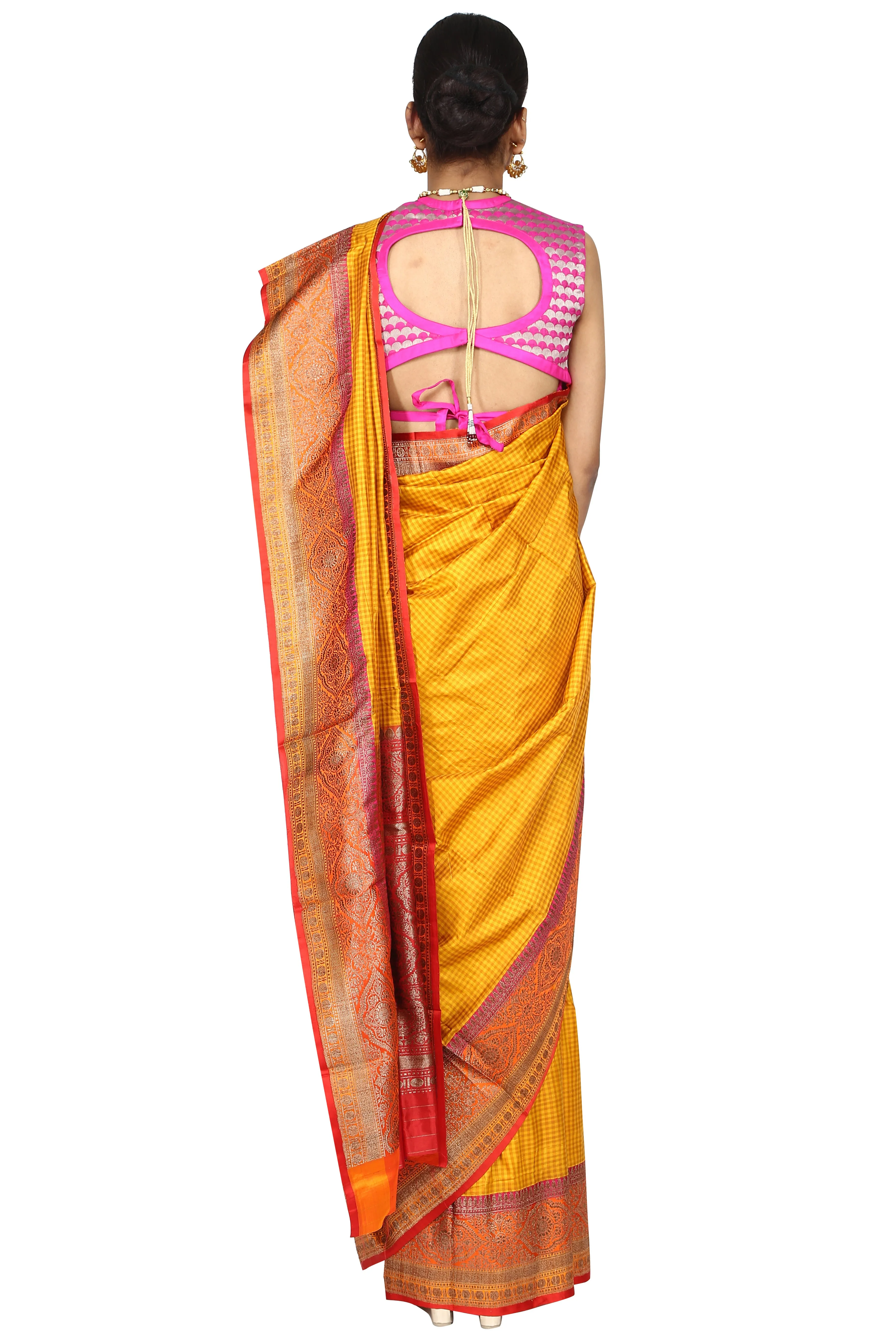 Yellow golden weave saree.